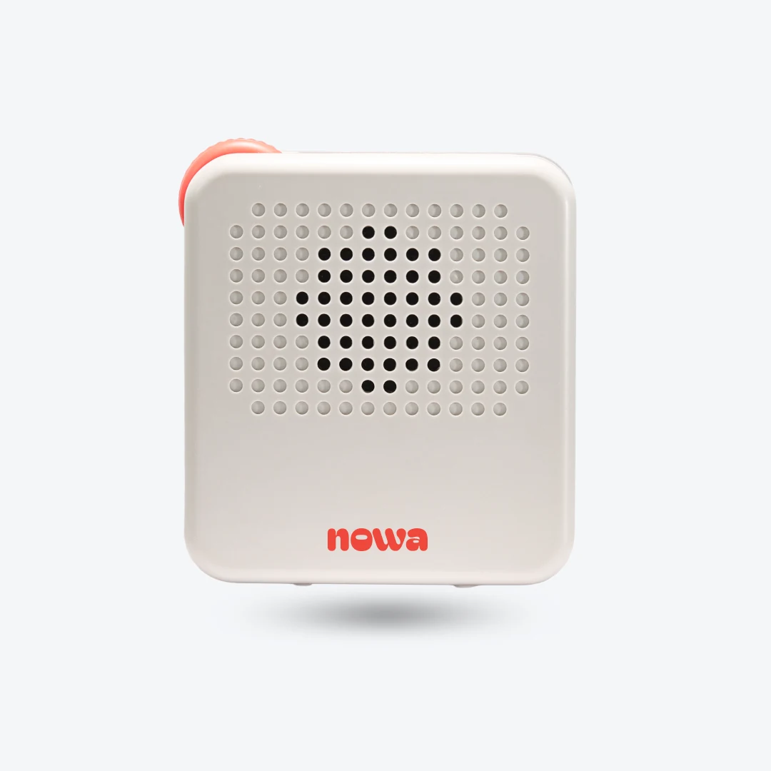 Back of the Nowa device with speaker grille and coral Nowa logo